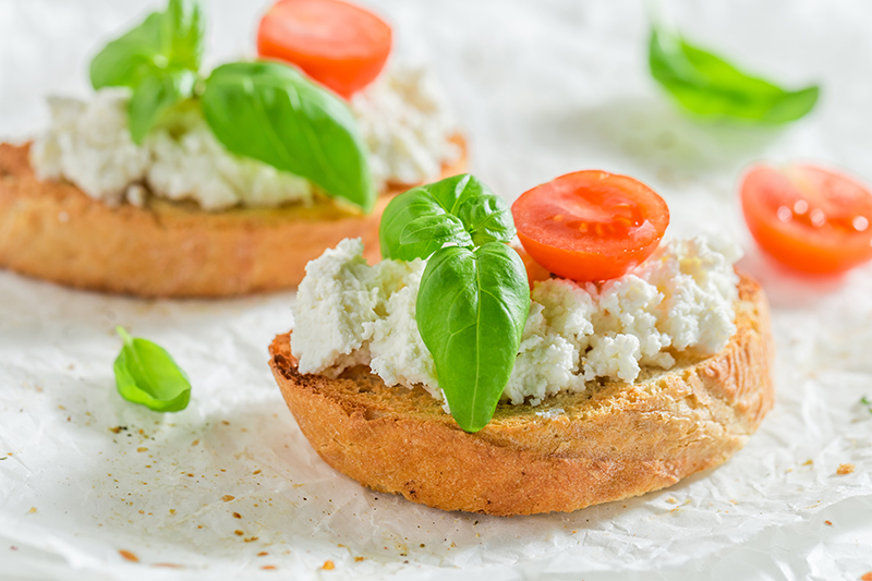 Bruschetta with ricotta cheese and tomato